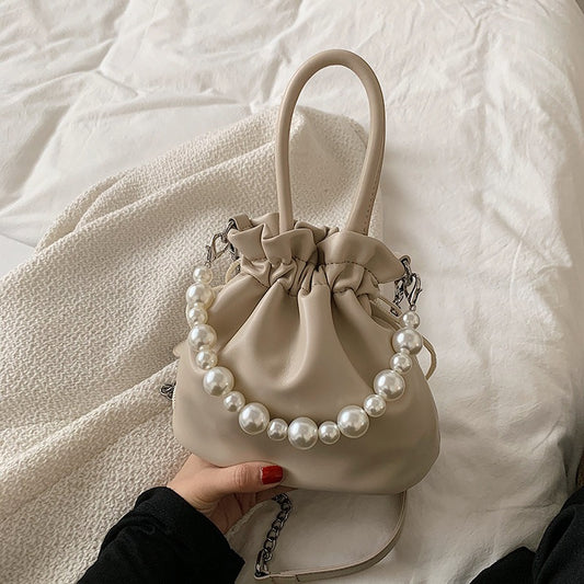 Pearl chain pleated shoulder bag women new solid color soft surface ins beam mouth portable Messenger bag