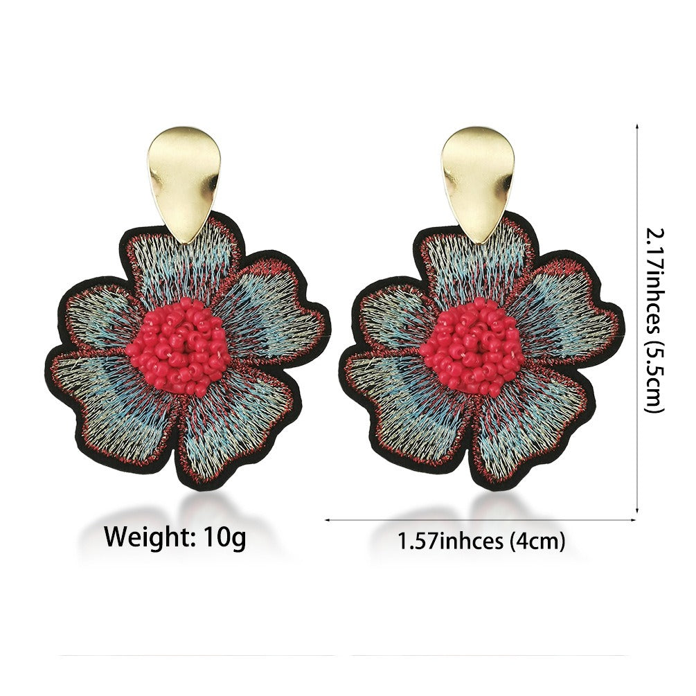 Japanese and Korean ins fashion all-match earrings female round rice bead flower pendant alloy earrings